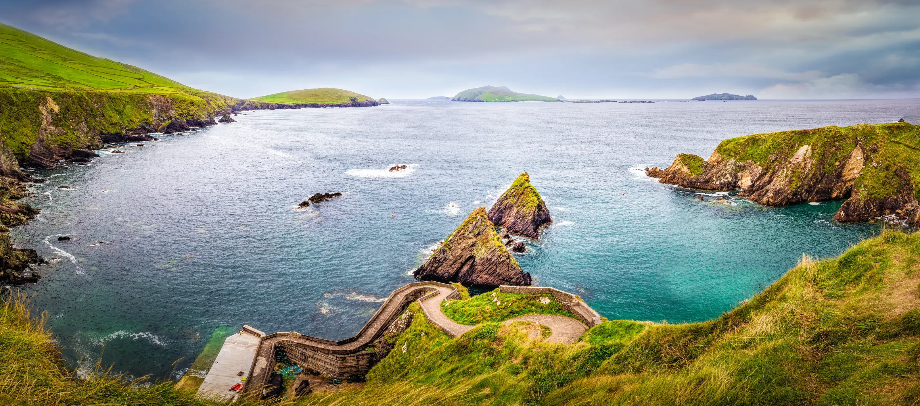 Green pastures and Atlantic coastline in County Kerry, Ireland